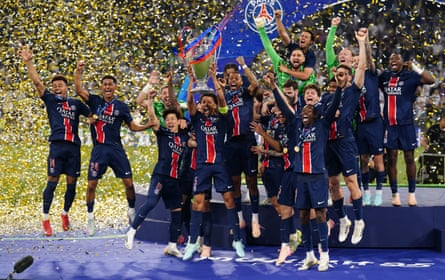 Marquinhos lifts the trophy after his team’s victory in the Champions League final match between PSG and Inter