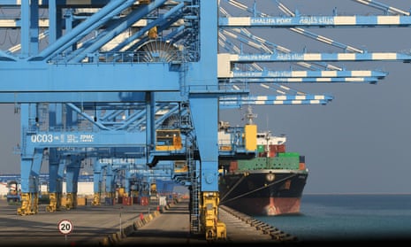 A container ship is moored at Abu Dhabi's Khalifa port, where US intelligence concluded suspicious construction activity, including huge excavations, was taking place