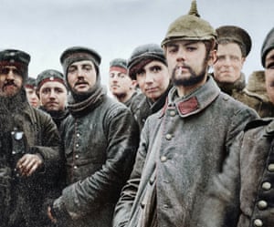 5th London Rifle Brigade soldiers with German Saxon regimental troops at Ploegsteert Wood, on the western front, during the Christmas truce in 1914: black and white image coloured by artist Marina Amaral
