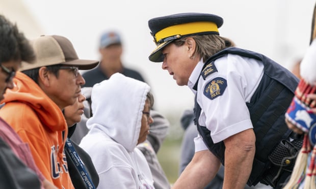 The RCMP commissioner, Brenda Lucki, speaks with victims’ family members at an event after the mass stabbing incident that happened at James Smith Cree Nation and Weldon, Saskatchewan.