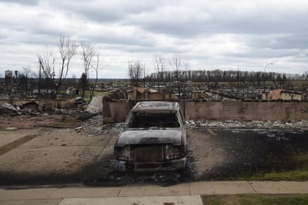 A burned-out vehicle in the Beacon Hill neighbourhood of Fort McMurray.