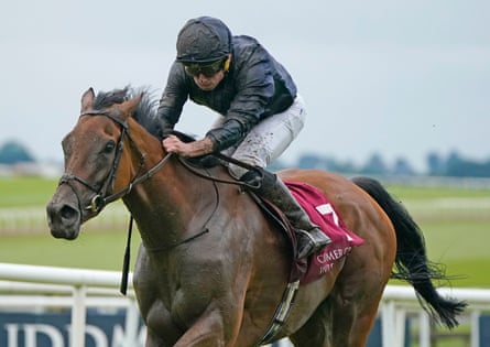 Emily Dickinson, ridden by Ryan Moore, wins The Curragh Cup.