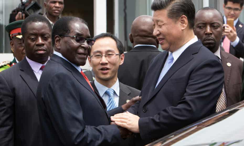 Chinese president Xi Jinping shakes hands with Robert Mugabe on a 2015 trip to Harare.