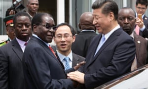 China’s president, Xi Jinping, shakes hands with his Zimbabwean counterpart, Robert Mugabe, in Harare in 2015.