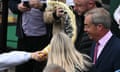 A person throws the contents of a drinks cup in the face of  Nigel Farage during his general election campaign launch in Clacton-on-Sea.