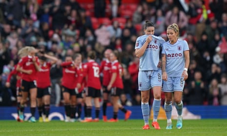 Aston Villa’s Rachel Daly (right) and Emily Gielnik look dejected after Manchester United score their fifth goal