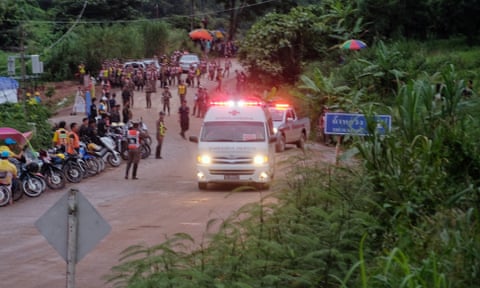 An ambulance carries one of the boys