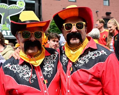 Two Belgium fans dressed as cowboys