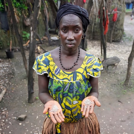 Horticulturist Anjuleta Gomes holds seeds in her palms