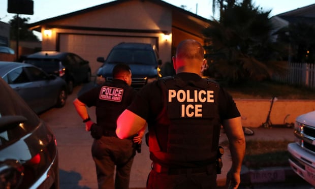 An Ice team arrives to arrest an immigrant at a home in Paramount, California, 1 March 2020.