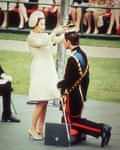 Queen Elizabeth II crowns her son Charles, Prince of Wales, during his investiture ceremony at Caernarvon Castle