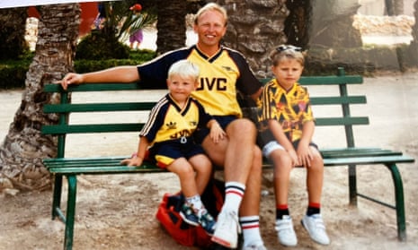 Graham Searles (left) with dad Ray and brother Adam wearing their colours with pride on holiday in Spain. 