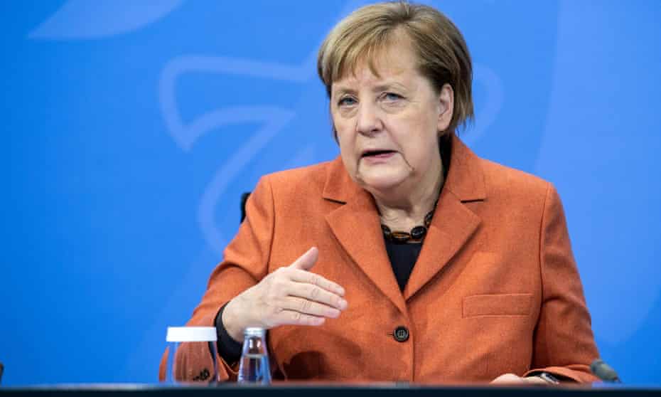 Angela Merkel announcing the new measures on Sunday.