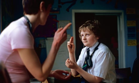 A deaf pupil with a specialist teacher