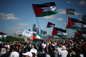 Supporters wave Palestinian flags
