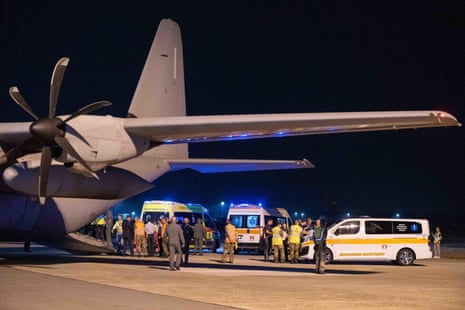 Medics wait during the arrival of the special Italian Air Force flight carrying the group of Palestinian children evacuated from the Gaza Strip who will be treated in Italy.