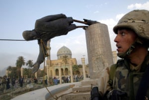 A US soldier watches as a statue of Iraq’s President Saddam Hussein falls in central Baghdad 9 April, 2003. Tomasevic says “I went down there and took pictures of this guy looking at the statue. I came closer to him and had the perfect picture – a US Marine looking at a statue pulled down by Americans.” That image has been reproduced hundreds of times or more in the years sincethe statue fell. “I didn’t expect this picture to be in so many publications,” Tomasevic said. “But I guess it does show the end of the Saddam era.”