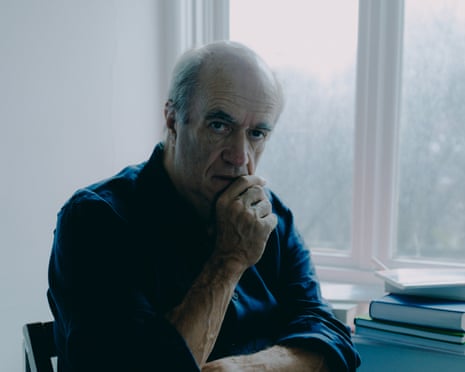 Colm Toibin seated by a window
