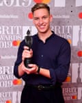 George Ezra with the award for British male solo artist.