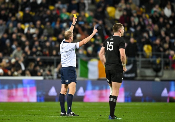 Wayne Barnes gives his yellow card.