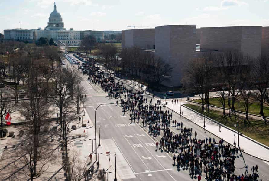 Thousands of students march down Pennsylvania Avenue in Washington, DC.