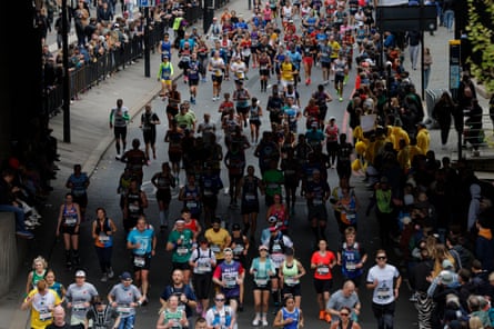 An arial view of a mass of runners on taking part in the London Marathon