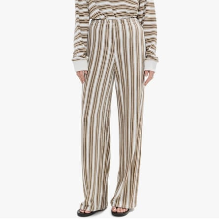 A model wearing a pair of striped pants with matching top