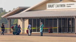 Passengers disembark a Qantas repatriation flight from India at RAAF Base Darwin on 15 May.