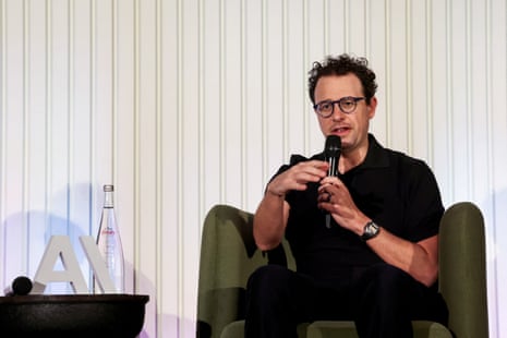 Dario Amodei speaks while seated