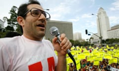 File photo of American Apparel former owner Dov Charney speaking during a May Day rally protest march for immigrant rights, in downtown Los Angeles<br>American Apparel former owner Dov Charney speaks during a May Day rally protest march for immigrant rights, in downtown Los Angeles in this file photo taken May 1, 2009. American Apparel Inc has officially fired its founder and former Chief Executive Officer Dov Charney, months after it suspended him for misconduct, according to a news release December 16, 2014. REUTERS/Mario Anzuoni/Files (UNITED STATES CONFLICT SOCIETY - Tags: BUSINESS)