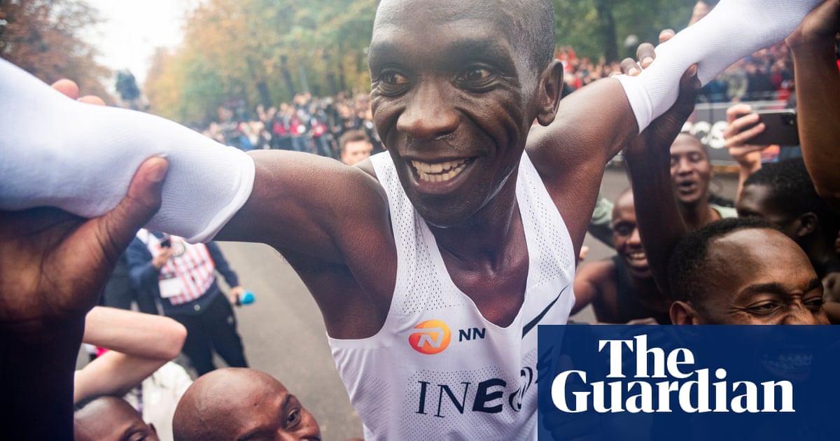 Eliud Kipchoge crosses the finish line in first-ever sub two-hour marathon – video