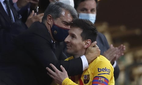 Lionel Messi gets a hug from Joan Laporta after Barcelona won the Copa del Rey last month.