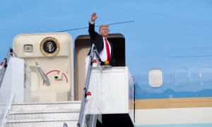 Donald Trump waving goodbye before departing from Paya Lebar Air Base in Singapore, 12 June 2018, after his meeting with North Korean leader Kim Jong-un at the Capella Hotel on Sentosa Island.