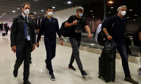 Novak Djokovic at Melbourne airport before boarding a flight to Dubai.
