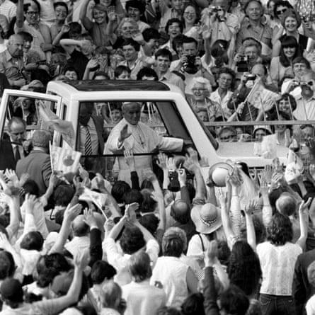 Pope John Paul II in his bullet-proof Range Rover popemobile, designed by Tom Karen, at Wembley Stadium, 1982.