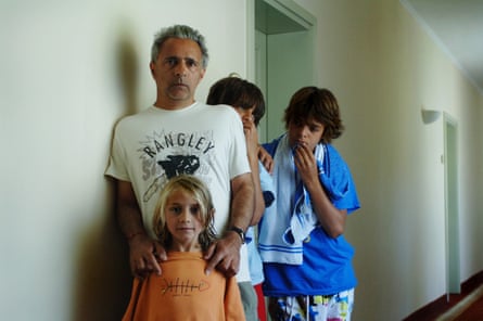 Writer Hanif Kureishi with his sons Sachin, Carlo and Kier on holiday at the Grand Hotel Gardone by Lake Garda, Italy.