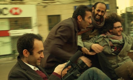 A scene of Khalid filming his friends in a downtown street