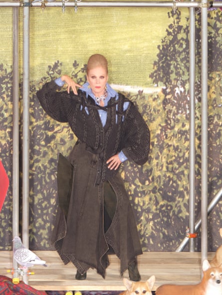 Joanna Lumley wearing a loose-fitting brown cardigan and a long brown denim skirt