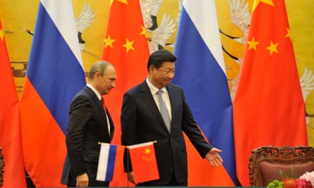 Xi and Putin before their meeting at the Great Hall of the People on 3 September 2015 in Beijing, China.