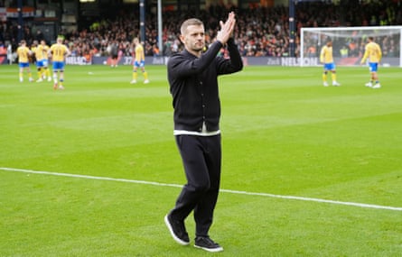 The Luton manager, Jack Wilshere, claps the crowd before a League One match at Kenilworth Road.