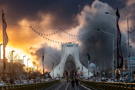 Smoke billows following a US-Israeli air strike near the Azadi (freedom) tower in Tehran on 3 March, 2026.