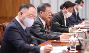 South Korean President Moon Jae-in presides over the fourth emergency economic meeting on coping with the coronavirus crisis at the presidential office in Seoul, South Korea, 8 April 2020.