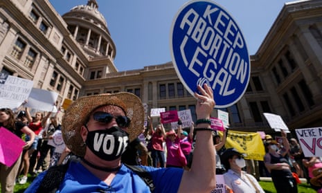 Abortion rights demonstrators attend a rally at the Texas state capitol in Austin on 14 May.