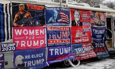 Flags for sale before a Trump rally.