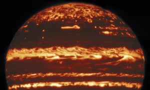 The images show the warm, deep layers of the planet’s atmosphere glowing through gaps in thick cloud cover