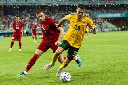 ‘Against Turkey Aaron Ramsey (right) and Daniel James seemed to be running through a haze of light, drunk on the air, the moment, the noises.’