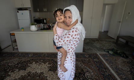 Mehreen Ibrahim and her daughter Eshal Haider, at their Pooraka home in Adelaide. Mehreen’s husband is in detention and she has not seen him in 2 and half years. Photo by Kelly Barnes for the Guardian