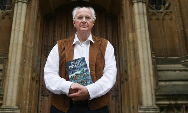 Darkness ahead … Philip Pullman poses with a copy of La Belle Sauvage: The Book of Dust Volume One.