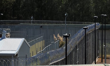 Razor wire fences around a prison yard