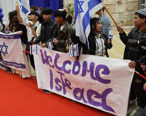 Relatives welcome members of the Bnei Menashe (Sons of Manasseh) community from India upon their arrival at Ben Gurion Airport in Lod, near Tel Aviv